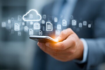 Businessman Holding a Smartphone with Holographic Cloud and Document Icons Flowing Above it. Concept of Mobile Cloud Storage, Digital File Synchronization, and Data Management


