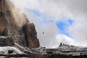 Cable car to Sass Pordoi, a 2,950 m high, plateau-like rock peak in the Dolomites, Italy