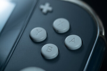 Extreme close-up of joystick buttons with shallow depth of field. © CurvyLens