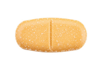 Oblong yellow pill isolated on transparent background, pharmaceutical tablet for medication and healthcare use