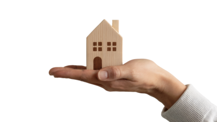  person holding a tiny house on their hand. Isolated on transparent background, png