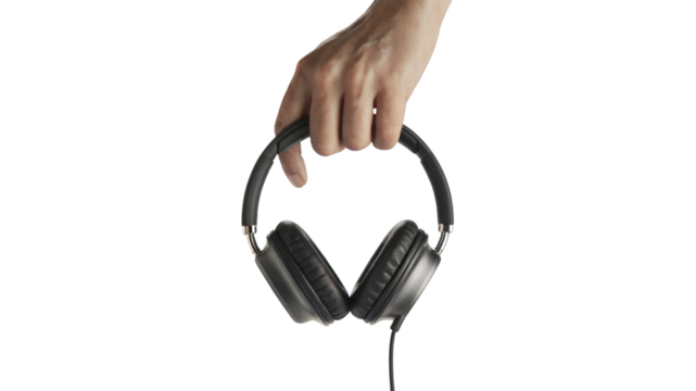 hand holding a pair of headphones. Isolated on transparent background, png