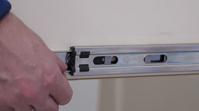 drawer guide mechanism, how to pull out a drawer guide, drawer slide lock