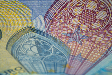 Close-up of a fragment of euro banknotes with gothic architecture.