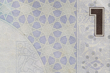 Macro Shot of One Riyal Inscription on Banknote