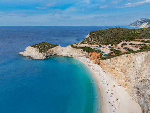 Aerial view of the striking contrast of the turquoise sea against the pale cliffs and sandy beach of Porto Katsiki, a sun-drenched jewel, Lefkada, Lefkada, Greece.