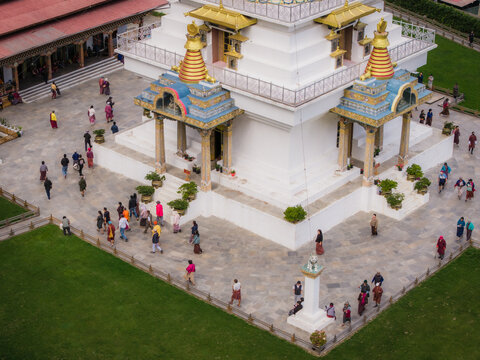 Thimphu, Bhutan - 26 September 2025: Aerial view of the Memorial Chorten, its white walls gleaming against the green lawn, where devotees circumambulate in a vibrant display of faith and reverence.
