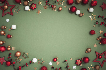 Christmas and New Year holiday background from festive decoration top view. Xmas ornament composition for greeting card.