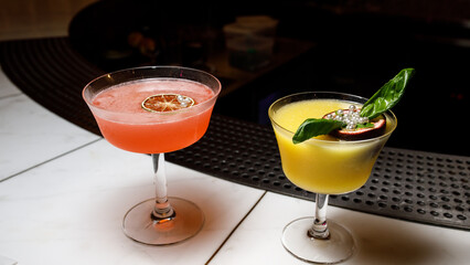 Alcoholic and non-alcoholic refreshing cocktails with mint, fruits and berries on a white background. 