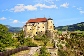 Fototapeta premium Rodenegg Castle is a medieval castle located near Brixen in South Tyrol, Italy. It was built in the 12th century by the lords of Rodank.