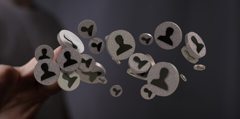 Person displaying a virtual network with human icons for social media, communication, or business connections, concept. 144 characters