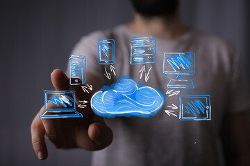 Man interacts with cloud computing network, data sharing concept. Digital technology, network, connection.