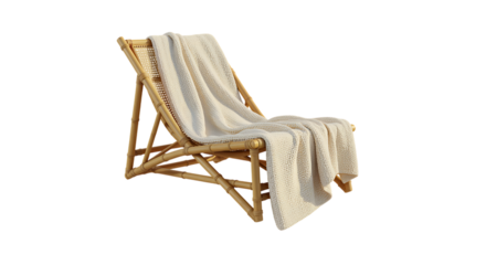 A cozy beach chair with a soft blanket perfect for relaxation on transparent background