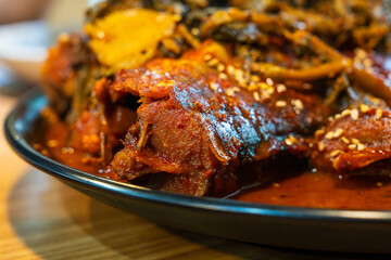 spicy half-dried pollack braised with dried radish greens