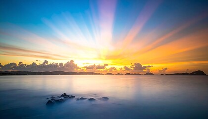 Obraz premium Beautiful sunset or sunrise reflection over river, lake, or sea water with orange and blue sky, clouds, and light horizon landscape