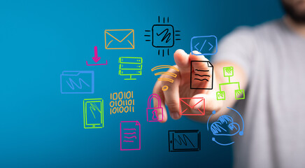 Hand pointing at colorful technology icons.  Data, network, digital, cloud, communication.
