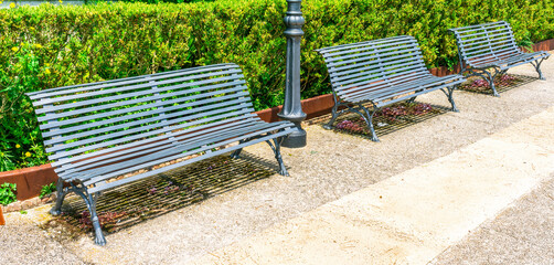 beautiful bench in a green park for relavation with amazing view to a pamorama above