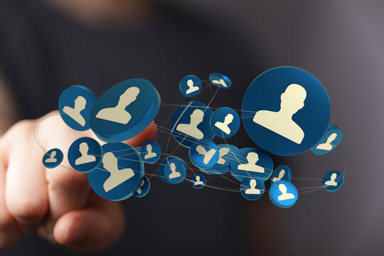 Digital composite of a hand with connecting icons representing social network, for use in presentations and websites.