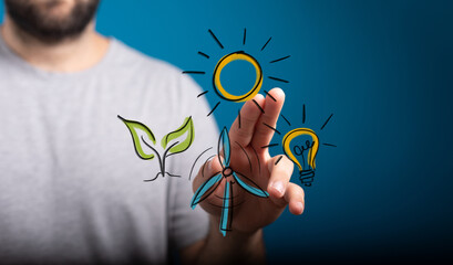 Hand interacting with eco-friendly icons: sun, plant, wind turbine, lightbulb. Concept of renewable...