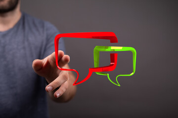 Illustrative concept of digital communication through vibrant speech bubbles connected by a hand...