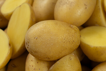 Fresh raw unpeeled potatoes close-up