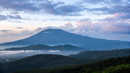 Naklejka premium mountain landscape with clouds