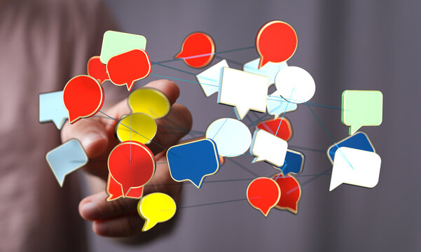 Conceptual image depicting communication network, with hand holding speech bubbles, ideal for technology or business themes - Powered by Adobe