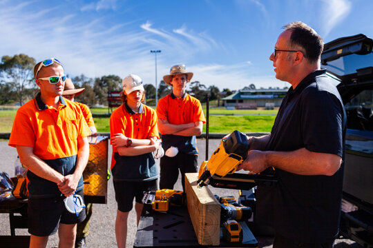 hands on tool demonstration during class for trade apprentices instructor talking about safety