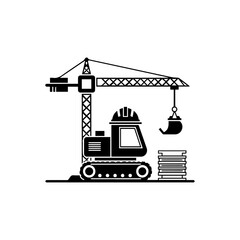 Construction scene A crane lowers a scoop near a track vehicle wearing a hard hat next to a stack of construction materials