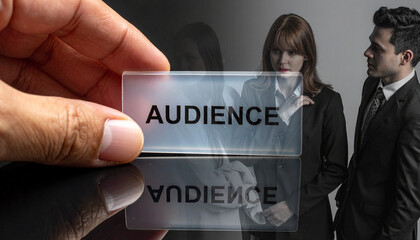 Close-up of a hand placing a translucent acrylic token labeled &ldquo;Audience&rdquo; on a reflect