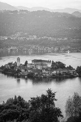 Night view of the San Giulio Island, in the middle of Orta Lake (Piedmont, Northern Italy): it is home to a convent of cloistered nuns.