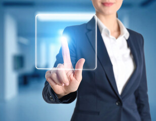 Businesswoman touch hologram interface square gesture technology innovation digital blur Confident businesswoman touch hologram interface square gesture technology innovation digital blur office