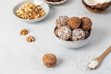 Homemade vegan healthy sugar-free candies made from dried fruits and nuts. Healthy eating.