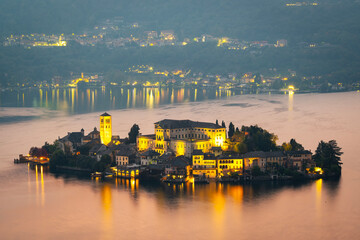 Night view of the San Giulio Island, in the middle of Orta Lake (Piedmont, Northern Italy): it is home to a convent of cloistered nuns.