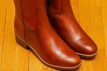 Modern female brown leather boots detail inside interior