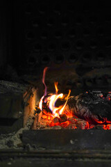 Burning fireplace in winter home