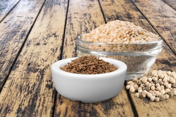 Sesame seeds scattered. Spices for buns and bread