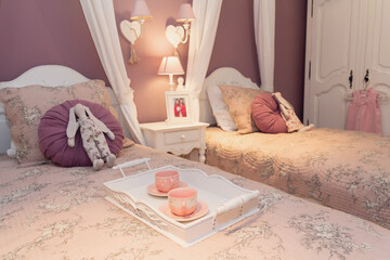 Classic interior of a children's room of bed tones