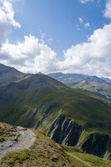 This landscape photo was taken in Europe, Italy, Aosta Valley, in summer. It shows the mountains of...