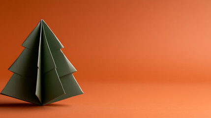 Minimalist Origami Tree: A simple green paper tree on a vibrant orange background. Perfect for seasonal crafts and decorations.