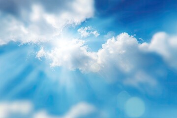 Bright, blue sky with fluffy white clouds, sun rays, and a gentle bokeh effect
