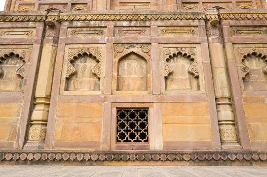 This landscape photo was taken in Asia, India, Uttar Pradesh, Prayagraj, in summer. It shows Nisar Begum s tomb at Khusro Bagh mausoleum in Prayagraj, under the Sun.