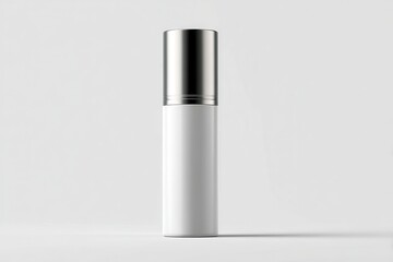 White cosmetic bottle with metallic cap stands against a light backdrop.