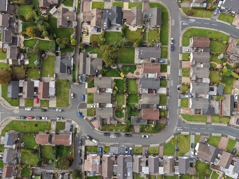 Aerial view looking down onto a houses and gardens in Bury Greater Manchester.  - Powered by Adobe