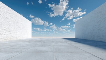 A square concrete courtyard opens to the sky, framed by white brick walls under a cloudy blue expanse