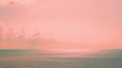 Colorful sunset seascape bay and beautiful soft pink orange sky clouds sun sunlight sunbeams, calm ocean and colored sunrise sky clouds beach vacation paradise, turquoise sea water in sun rays 4K. - Powered by Adobe