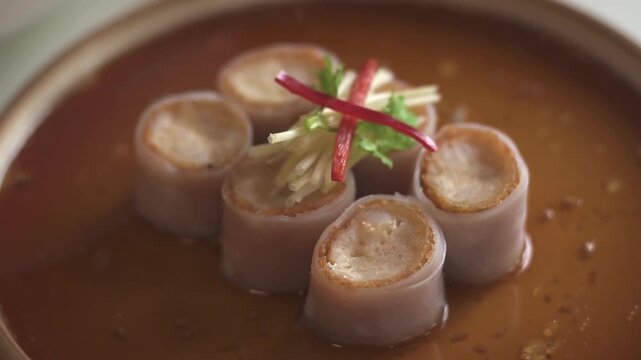 Fusion food of Dim Sum is traditional chinese food, people traditionally enjoy in restaurants for breakfast and lunch. Close up of Steamed Dim Sum in bamboo dish at chinese restaurants.