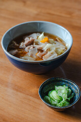 Japanese breakfast with pork soup and cucumber salad