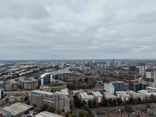 Obraz premium Aerial view of buildings and landmarks with views of Salford Quays in the background. Manchester England. 