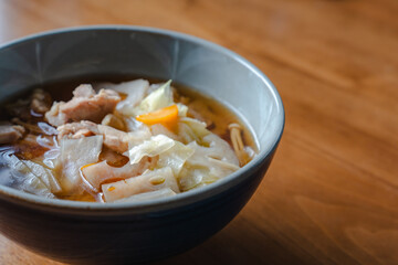 Japanese breakfast with pork soup and cucumber salad